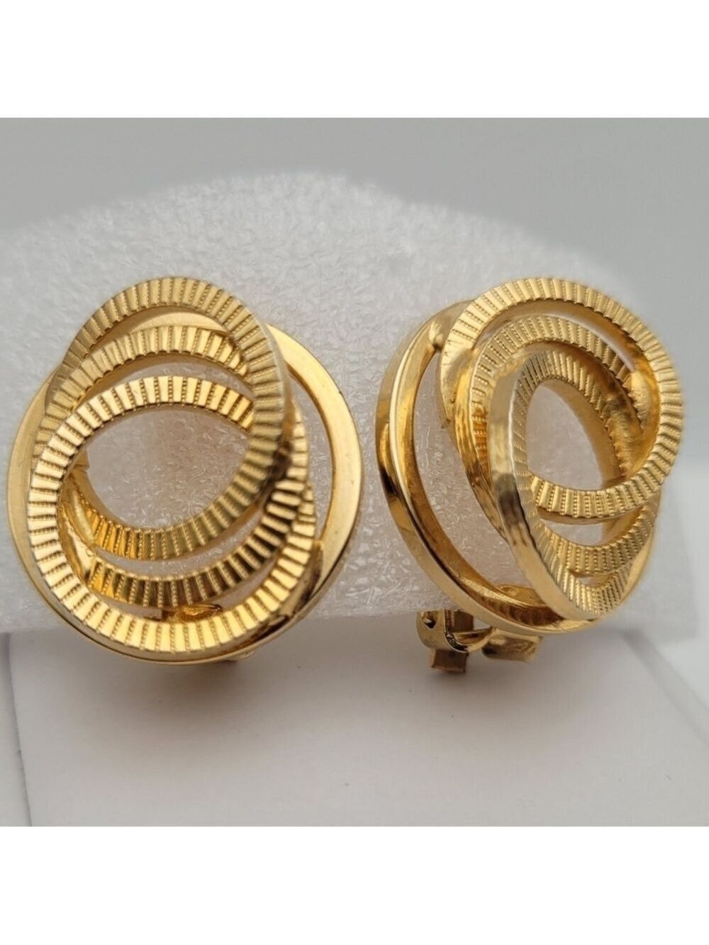 Circular Gold-Tone Clip Earrings Elegant Statement Accessory